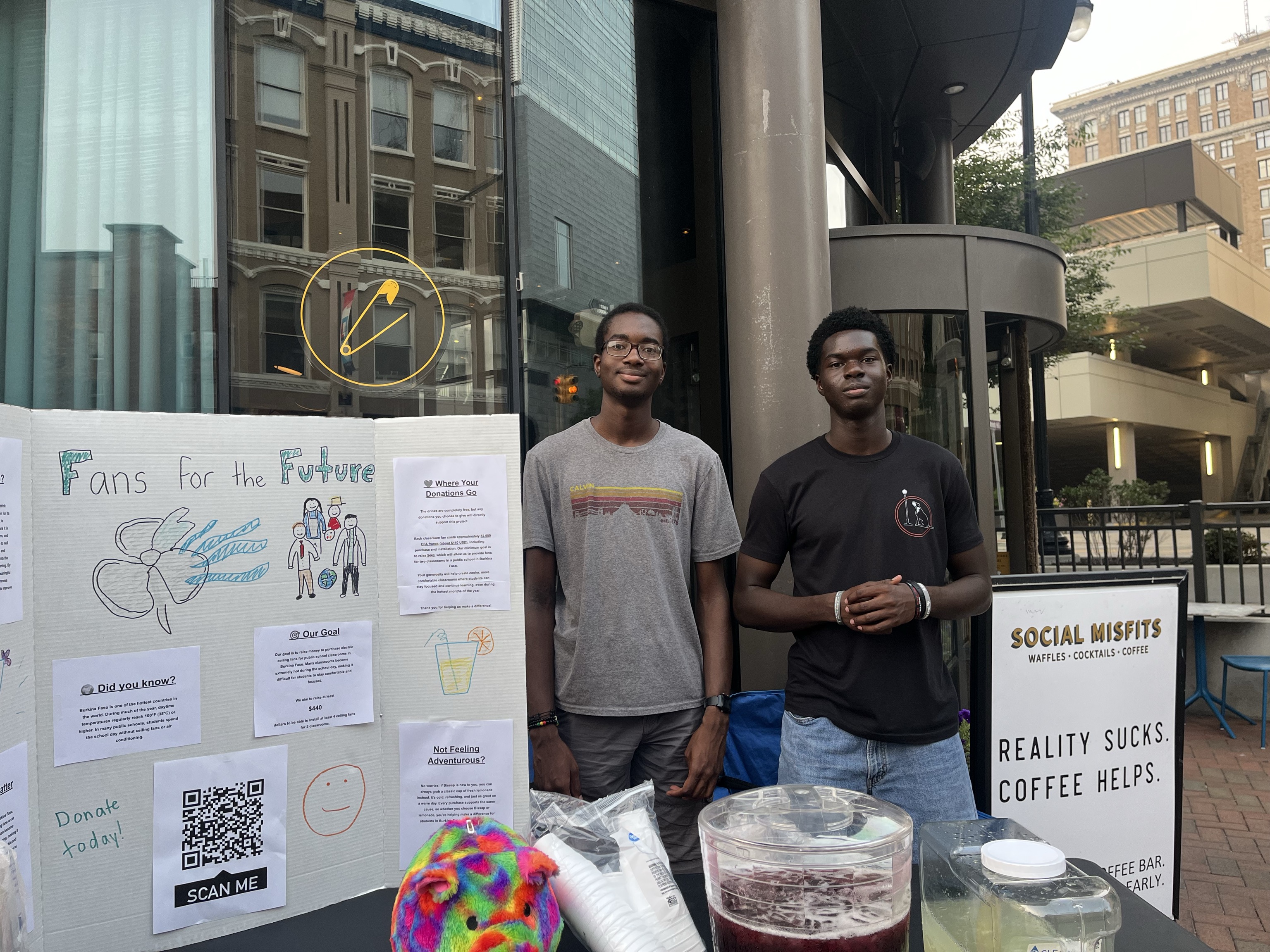 Yannis and Ezer at the stand